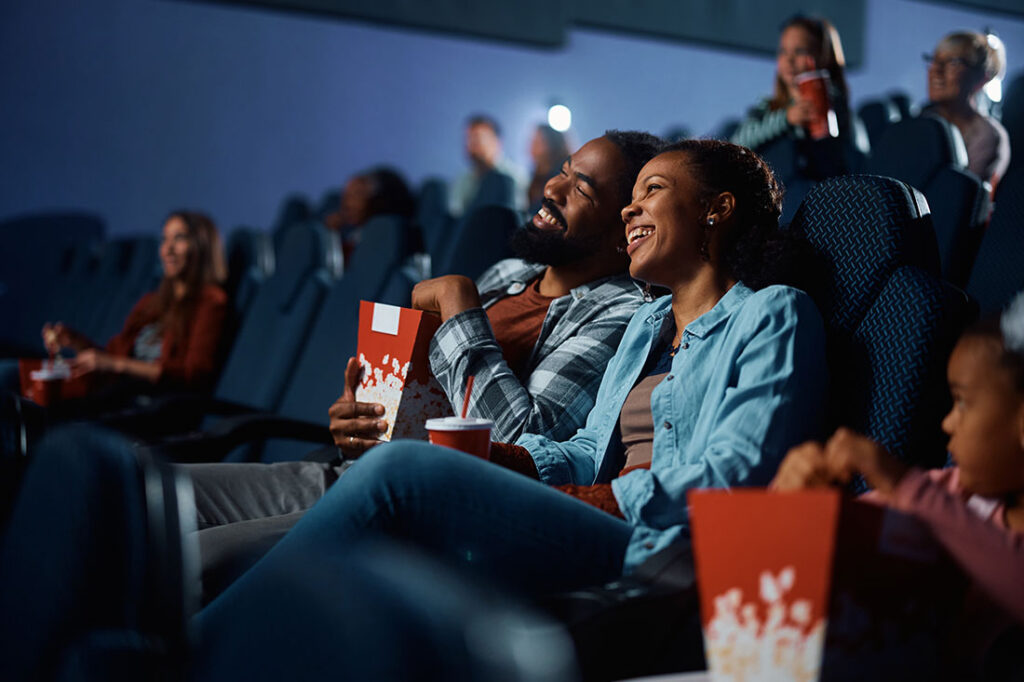 couple watching a movie in cinema