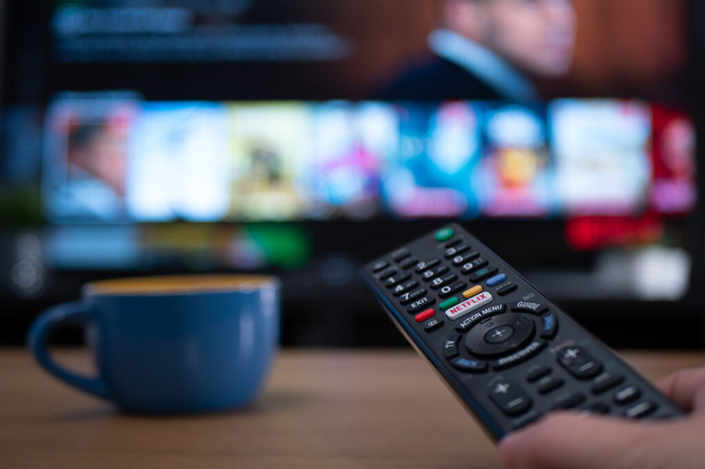 Remote control and television with documentaries on screen