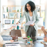 leader with business people and team in meeting