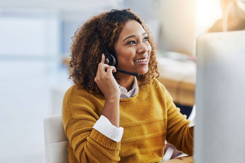 female agent working in a call centre with good customer service