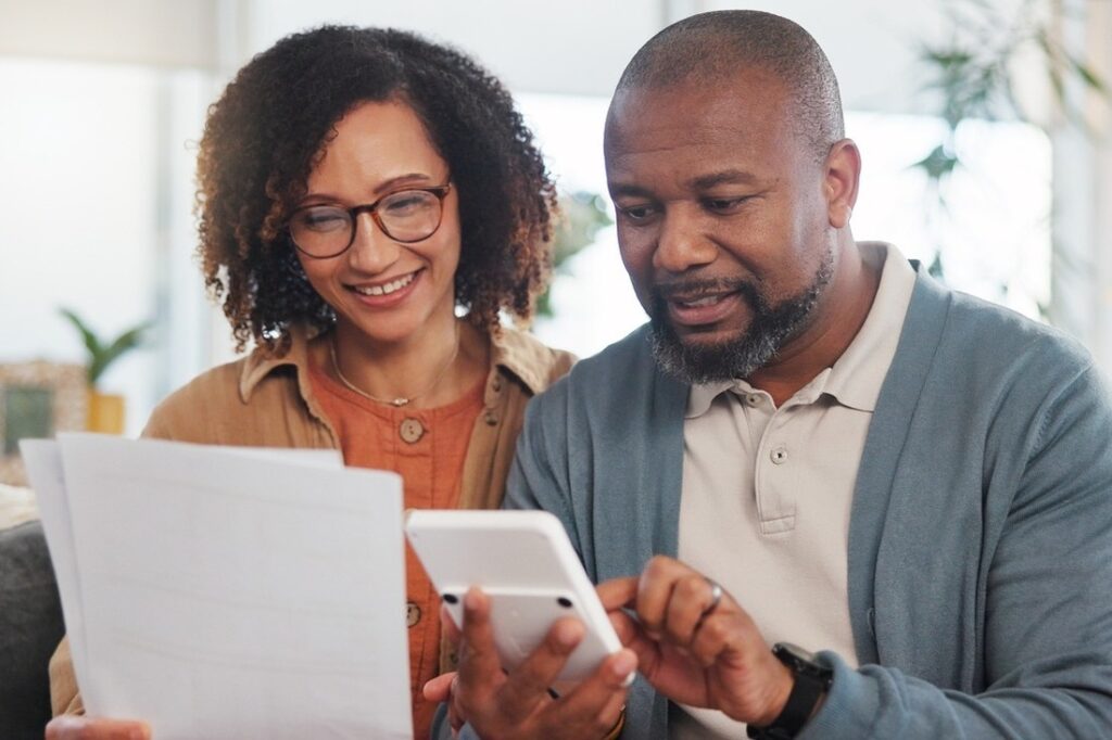 A Gen X couple doing retirement financial planning