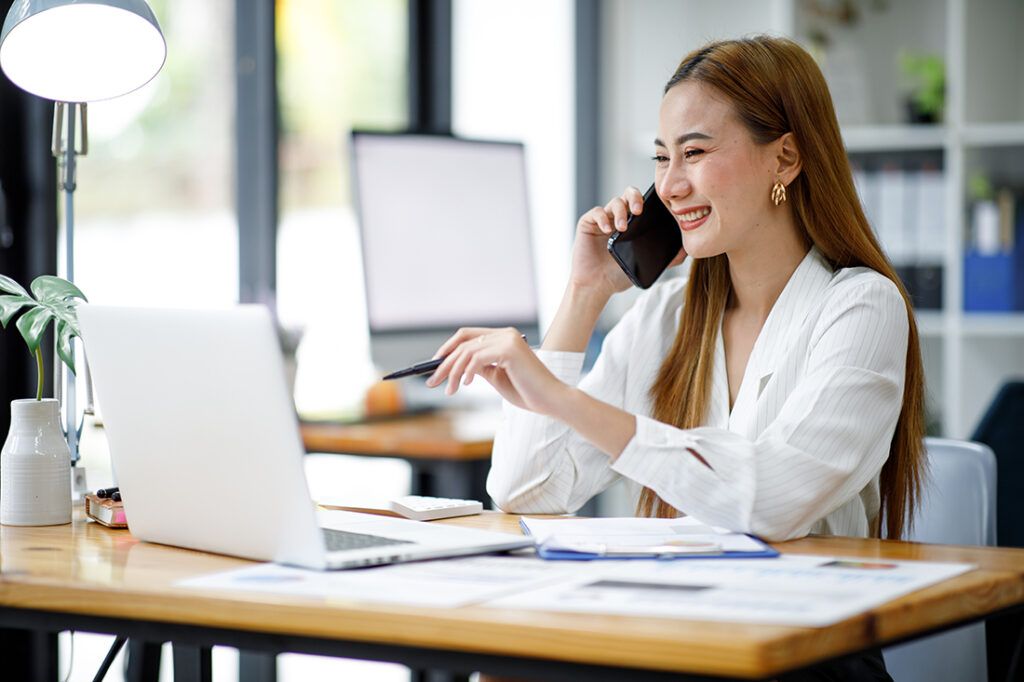 Confident businesswoman works on a PR strategy for her small business