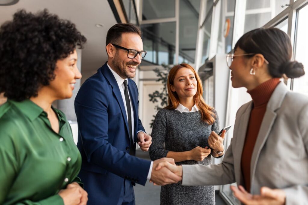 a group of businesspeople networking at a conference