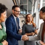 a group of businesspeople networking at a conference