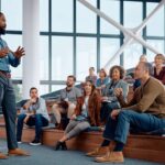 Leader at work giving a talk to colleagues