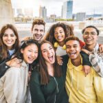 a group of Gen Z friends smiling together