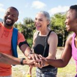 Happy group of people after accomplishing their new year's resolution ideas of exercising together