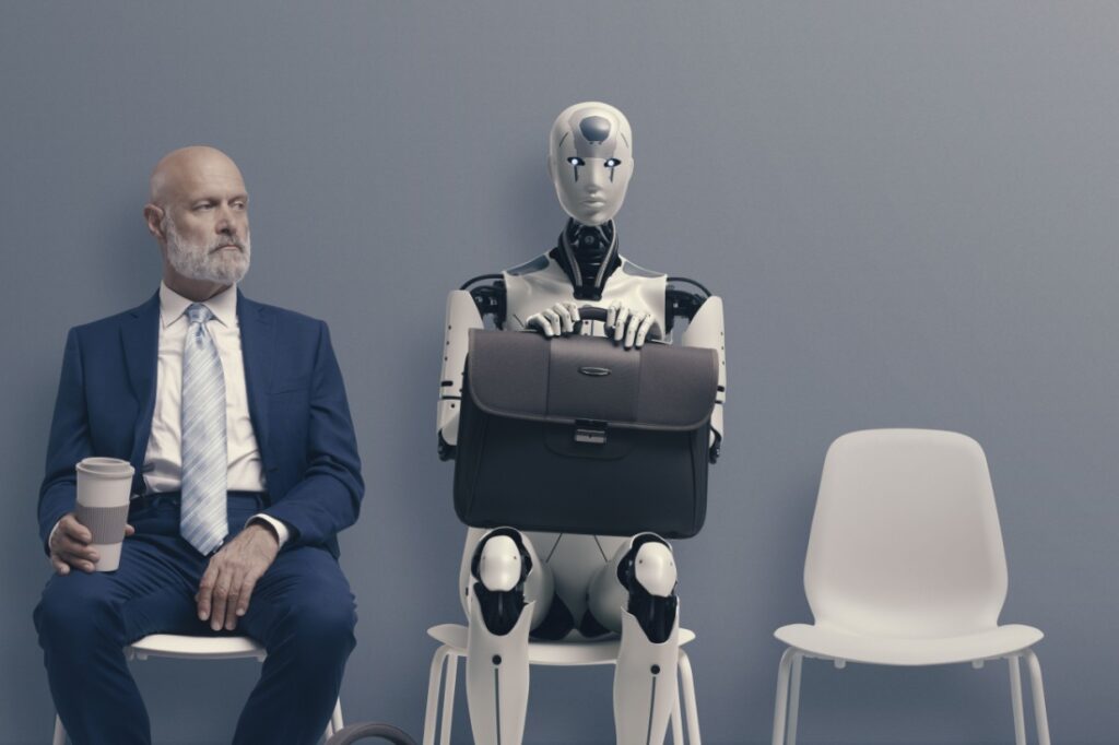A man and a robot wait for a job interview.