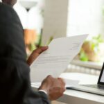 An HR manager looking at a cover letter.