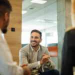 A man with his managers learning what is a stay interview