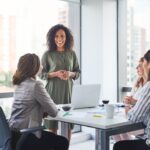 businesswoman leading a team meeting