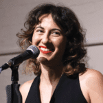 Jemma Rose Brown at a microphone